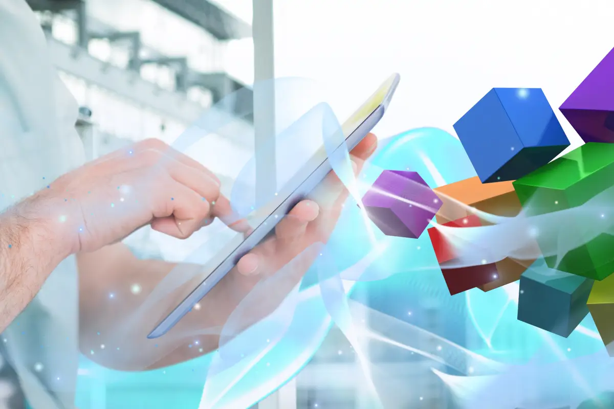 Persona utilizza un tablet con elementi digitali colorati che rappresentano l’innovazione e la digitalizzazione delle imprese in Sicilia.
